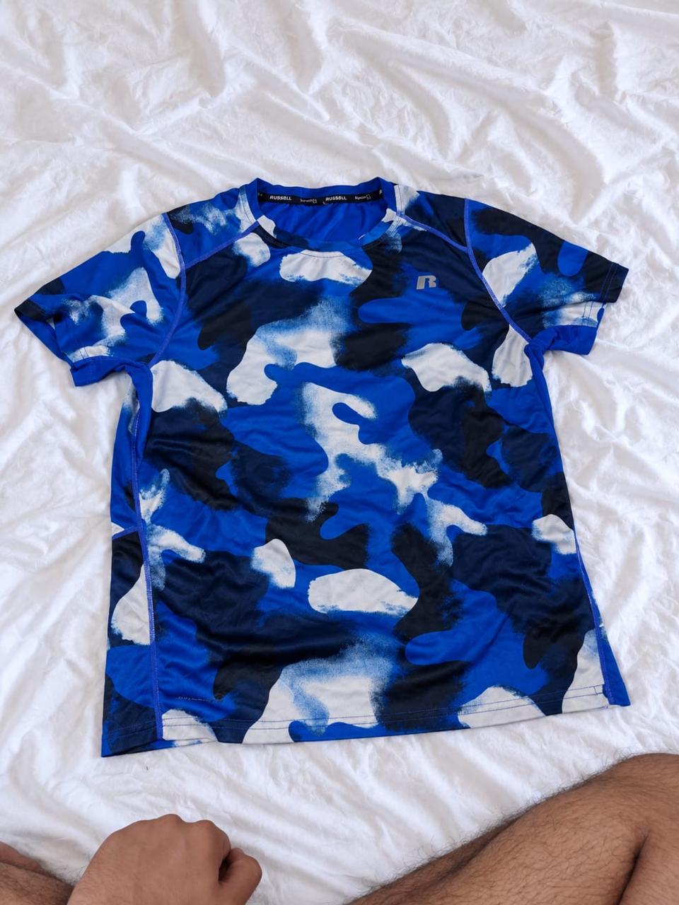 Blue, navy, and white short sleeve sports jersey shown from the front
