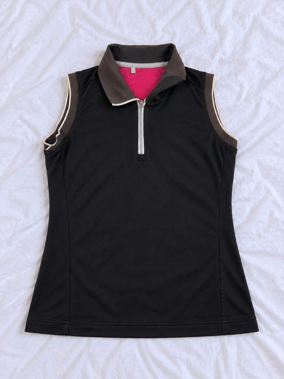 Black, grey, and pink sleeveless sports top shown from the front