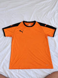 Orange and black short sleeve sports shirt shown from the front